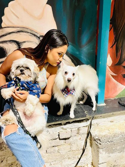 Two pups are better than one, especially on a birthday! This guest brought her two furry friends to celebrate, and our colorful mural made for a great photo backdrop.