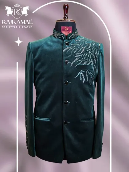 A full mannequin shot of a green velvet Jodhpuri, showcasing its timeless and classic silhouette.