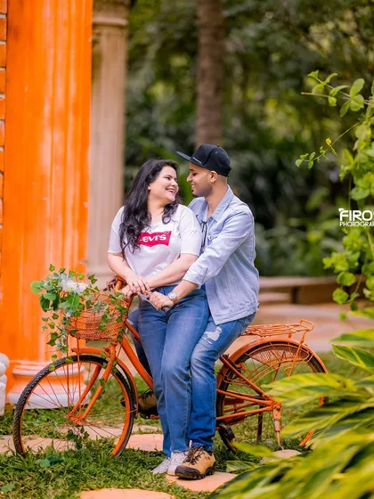 A fun and casual shot with a bicycle against a colorful building in the garden.