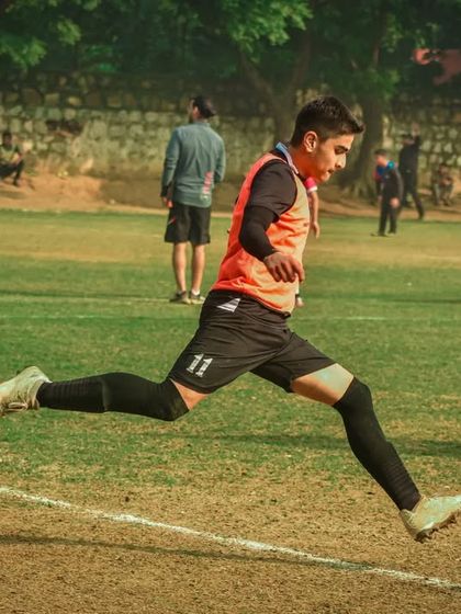 A player leaps to get a kick on the ball during Day 8 of the Pride Cup.