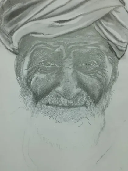 An in-progress look at the portrait of the man with a turban. At this stage, the focus is on establishing the deep shadows in the face to create a strong sense of form before adding finer details.