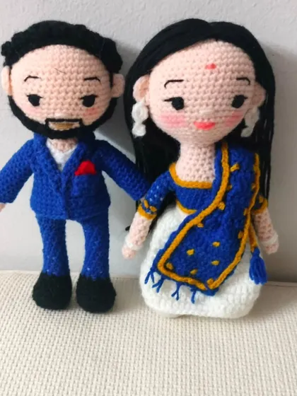 I love making these couple dolls for anniversaries and weddings. This one shows a lovely couple in a beautiful blue and white saree and a matching suit. I can make them in any dress you want, western or Indian.