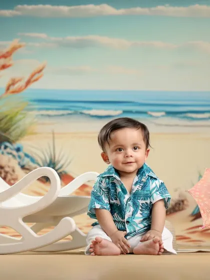 A happy beach vacation right here in the studio! This little guy's smile says it all. Such a fun and cheerful setup.