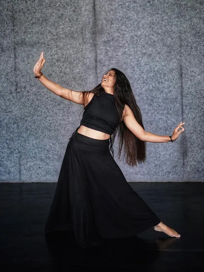 A moment of pure expression during a photoshoot. Dance is about finding freedom in movement, and this image captures that feeling of letting go.