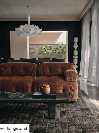 The main living area, showing the comfortable brown sofa and the view through to the dining room. This image was part of our cover story for Livingetc magazine.