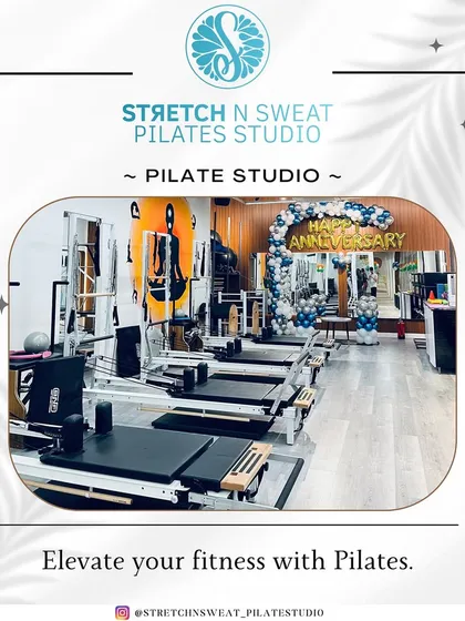 A glimpse of our main workout area, equipped with top-of-the-line Pilates reformers. We've created a clean, motivating space for you to focus on your fitness goals.