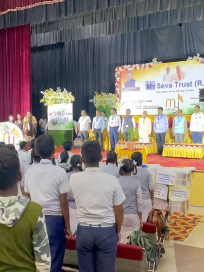 Students standing for the national anthem, a moment of collective respect and patriotism that set the tone for the event.