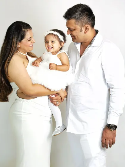 A classic family portrait session, timeless and full of love. Coordinating in white creates a clean, bright look that keeps the focus on the happy interactions and beautiful smiles.