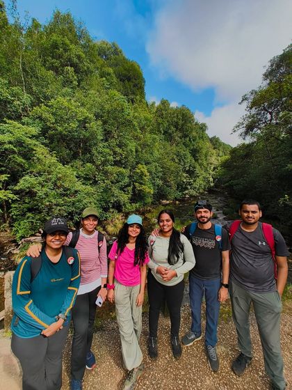 A group of friends enjoying the forest section of the Kurinjal trek.