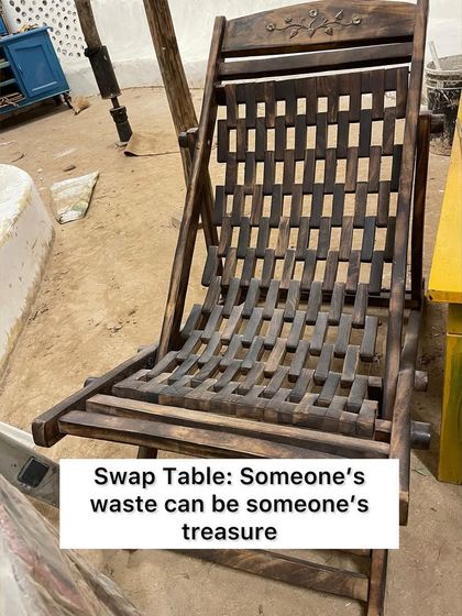 A perfect example of a swap table find. This wooden chair, once someone's waste, is now a treasured piece for a community art studio. This is the power of reuse and sharing resources.