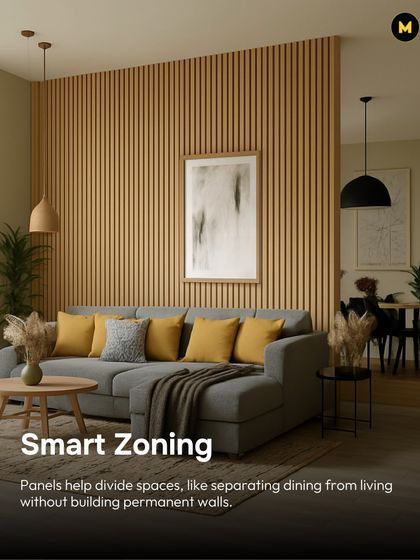 Panels are excellent for smart zoning in an open-plan space. Here, a wooden fluted panel wall helps divide the living and dining areas without building a permanent wall, maintaining an open feel.