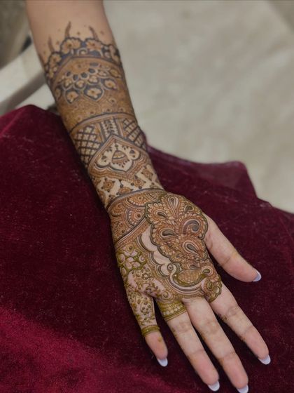 The same design, showing how the pattern flows from the palm up to the wrist.