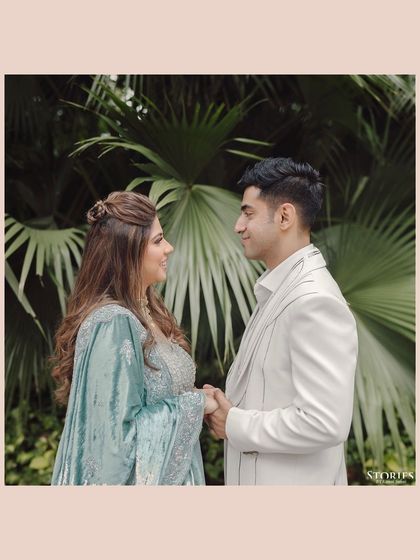 A sweet, candid portrait of Rupen and Shikha, their genuine smiles reflecting their happiness.