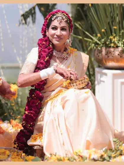 This bride's Haldi look is truly unique, with a braid made of over 150 fresh roses. The makeup is soft and glamorous, with dewy skin and a dreamy nude lip.