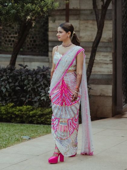 The full look, including her trendy pink platform heels.