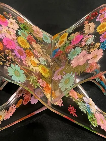 A truly unique piece, this Quran stand is made from clear resin with real, colorful flowers preserved within. It’s a vibrant and joyful expression of faith, customized for a client who wanted something special and full of life.