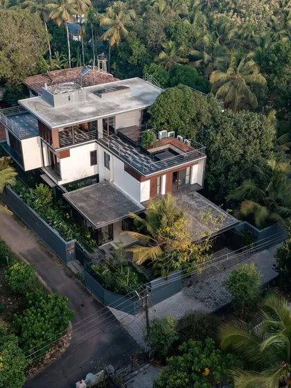 Even in a private residence like the Mango Tree Yard in Thrissur, our master planning principles apply. We designed the entire layout around two mature mango trees, creating a home that lives in dialogue with nature and preserves the site's original character.