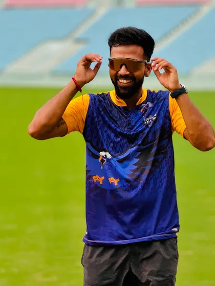 Adjusting the shades, but the focus remains sharp. Enjoying the beautiful moments that come with being part of a professional cricket league.