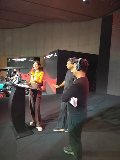 Our team coordinating with the anchor during rehearsals for the Kinetic Green & Tonino Lamborghini launch. Anchor management is a key part of our show running services.