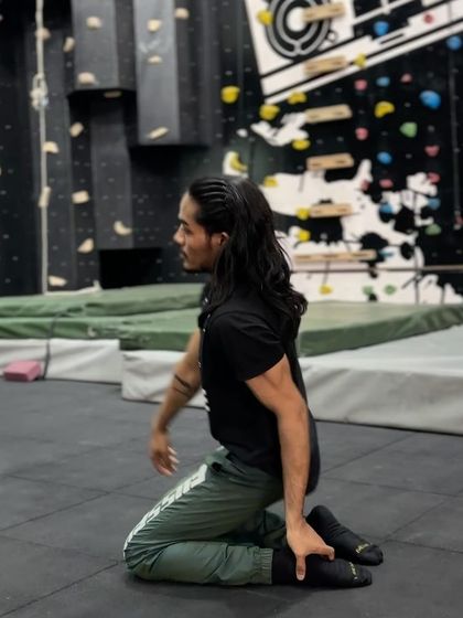 The camel pose with rotation is an advanced thoracic opener that improves flexibility in the spine and shoulders.