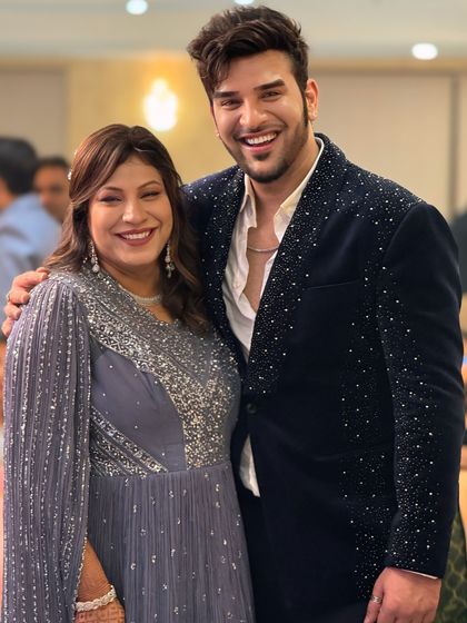 Celebrity Paras Chhabra looking sharp in our custom navy blue velvet blazer, which is covered in sparkling Swarovski crystals. A perfect statement piece for a high-profile event.