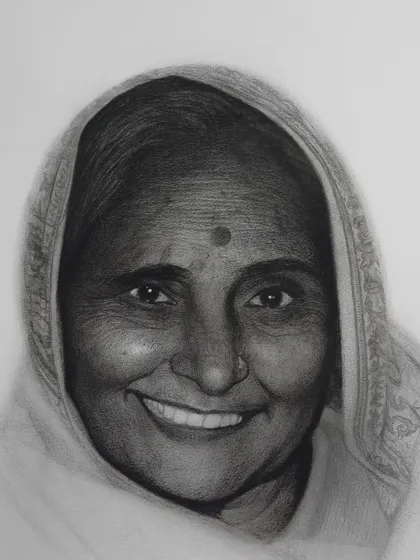 A portrait of a woman with a beautiful, warm smile. Capturing genuine emotion is one of the most rewarding aspects of portraiture.
