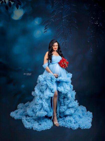 Changing the backdrop to a deep, moody blue creates a completely different feel. This portrait is dramatic and mysterious, like a scene from a fairytale forest at twilight.