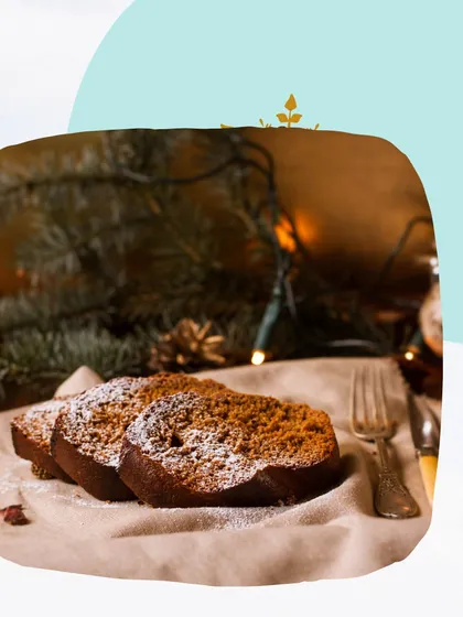 Slices of my gingerbread-spiced cake, lightly dusted with powdered sugar. This cake offers a different festive flavor profile, full of warm spices that are perfect for a cozy winter evening.