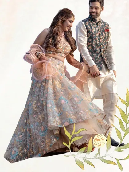 A candid moment of the couple walking hand-in-hand, sharing a smile. These are the simple, happy moments we love to create space for.