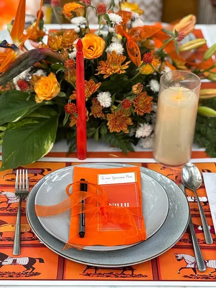 The smallest details make the biggest impact. This elegant tablescape features a personalized menu and a vibrant, Hermès-inspired theme, showing the level of detail I bring to VIP dinners and client appreciation events.