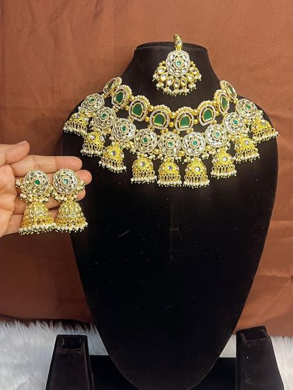 Our green and gold choker set, shown here with the matching earrings. This is a perfect choice for bridesmaids or family who want an elegant but not overpowering look. The quality and design are sure to get compliments.