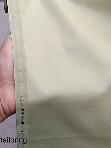 This is a Roviroy fabric in a light pistachio green. It is a high-quality terrycot material идеаl for stitching a durable and elegant saya kurta.