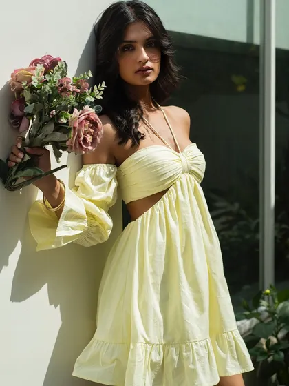 A confident and beautiful shot from the It Girl summer collection, with the model looking directly at the camera.