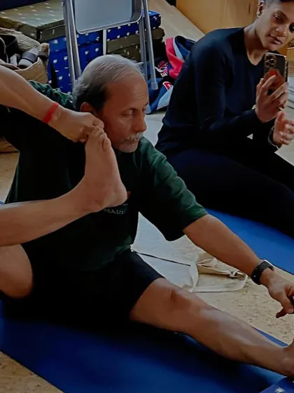 A deep hip-opening pose, Eka Pada Sirsasana, demonstrated during the workshop in Nice, France.