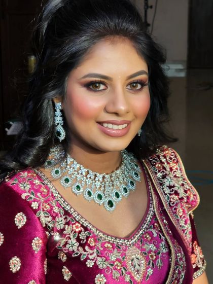 A close-up of Remya's sangeet makeup. The focus was on her eyes, with a beautiful blend of colours and dramatic lashes.