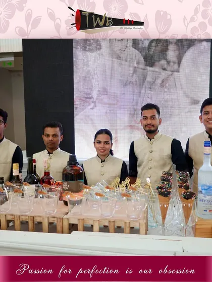 Our professional team for a reception at the Trident Hotel, looking sharp in their uniforms and ready to deliver top-notch service.