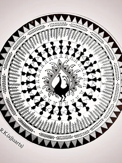 The full view of my circular Warli painting. This art form uses basic geometric shapes to create a beautiful narrative of social life, and I find the process of creating it very meditative.