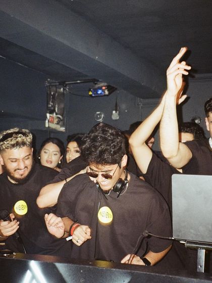 The crew behind the decks, vibing out. A good party is as much about the people you share it with as the music you play.