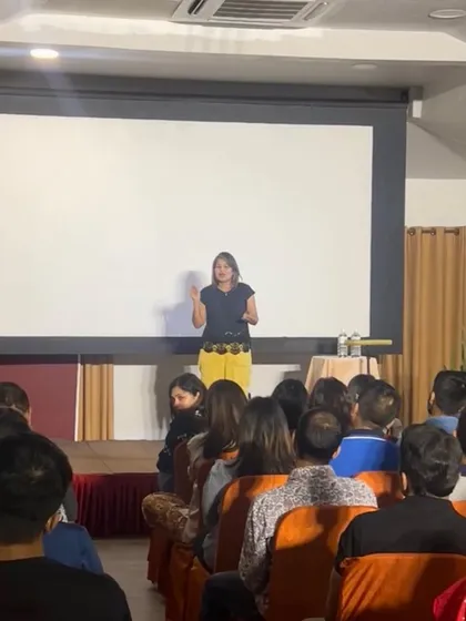 Performing my stand-up routine for the Toastmasters audience.
