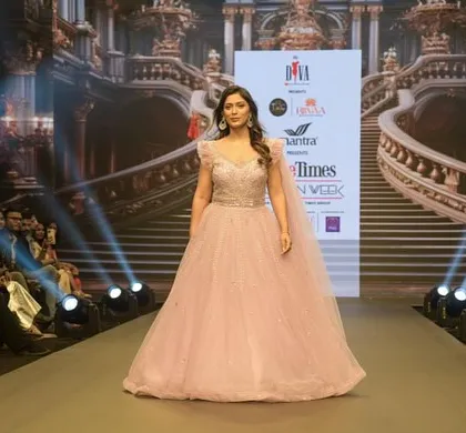 A full front view of the Muave Pink ball gown on the runway at Pune Times Fashion Week. This piece from my "Jashn-e-Ishq" collection celebrates love and beauty in every shape.