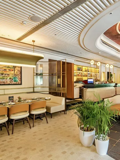 Another view of the restaurant, showcasing the Pandara Road Havemore artwork in its setting, evoking a sense of nostalgia and place.