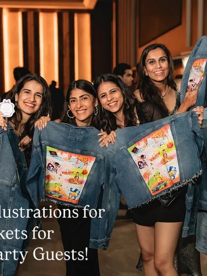 A group of happy wedding guests with their unique, illustrated jackets.