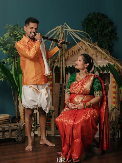 A playful moment with the father-to-be serenading his wife and their unborn baby.