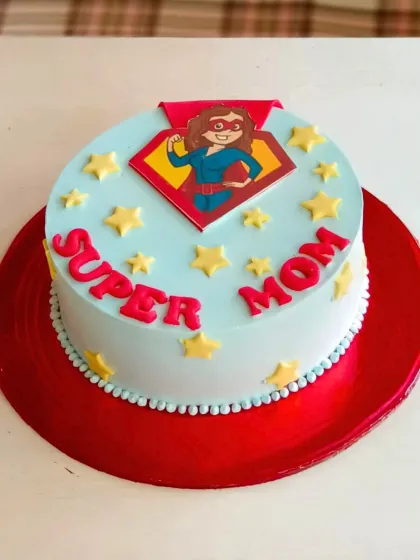 A fun "Super Mom" cake with a superheroine emblem, celebrating mom's superpowers this Mother's Day.