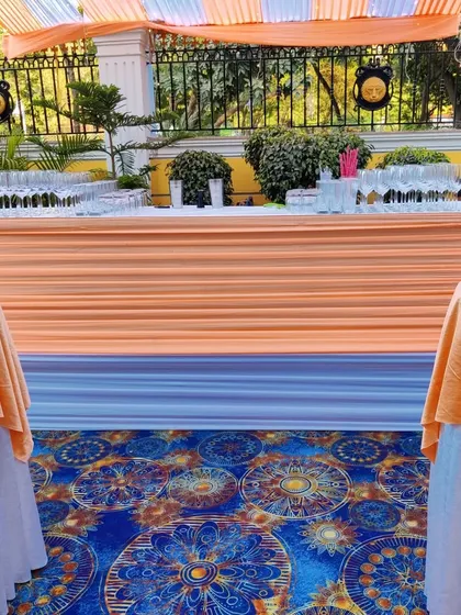 We can set up a full bar for your get-together or cocktail party. This includes the fabric-draped bar counter, all necessary glassware, and cocktail tables for a seamless guest experience.