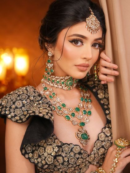 A close-up on this ethereal look, where the sharp winged liner cuts through the soft brown eyeshadow, creating a defined and captivating gaze.