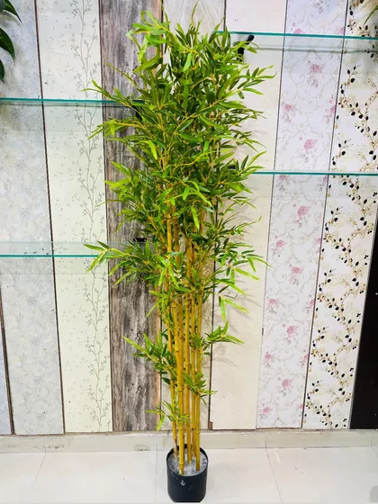 This artificial bamboo features natural-looking yellow canes, providing an authentic touch to the plant's overall appearance.