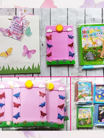 This beautiful butterfly-themed hamper includes a personalized paper bag, a handmade butterfly photo frame, and a magic water book.