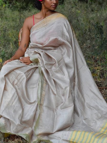 Our Genda Phool Kosa Silk Saree, a classic handloom piece with a beautiful drape. Perfect for those who love timeless elegance, this saree can be worn all year round.