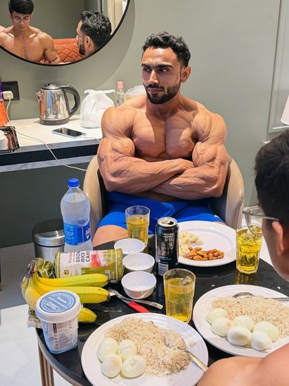 Time to eat. A pre-competition meal with boiled eggs, rice, bananas, and almonds. This is the clean fuel required to look your best on stage.